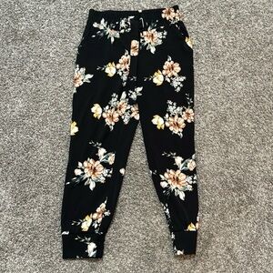 floral elastic waist pants has cuffed hams and adjustable elastic waist